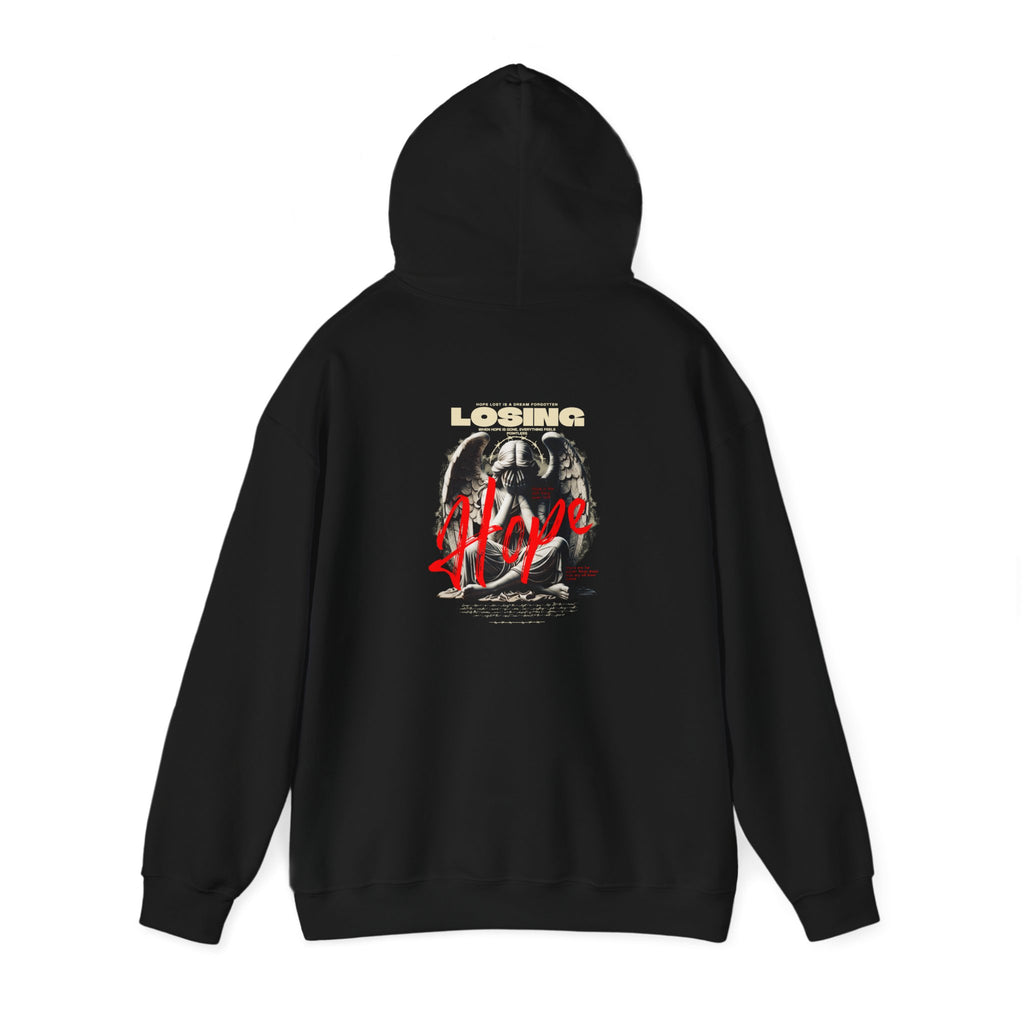 A black Hoodie featuring a bold motivational quote in white text across the chest, designed to inspire resilience and perseverance during tough times. The simple yet impactful design emphasizes strength and positivity, making it a perfect choice for anyone looking for encouragement and focus.