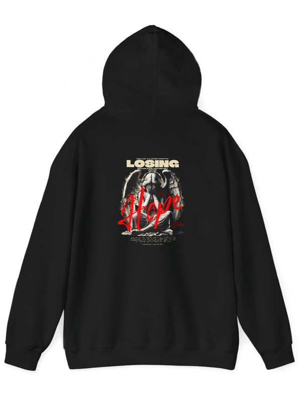 A black Hoodie featuring a bold motivational quote in white text across the chest, designed to inspire resilience and perseverance during tough times. The simple yet impactful design emphasizes strength and positivity, making it a perfect choice for anyone looking for encouragement and focus.