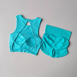 Women’s Seamless Backless Cross-Strap Yoga Set – Breathable Quick-Dry Sports Vest & High-Waist Pleated Hip-Lifting Shorts