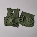 Women’s Seamless Backless Cross-Strap Yoga Set – Breathable Quick-Dry Sports Vest & High-Waist Pleated Hip-Lifting Shorts