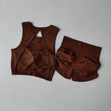 Women’s Seamless Backless Cross-Strap Yoga Set – Breathable Quick-Dry Sports Vest & High-Waist Pleated Hip-Lifting Shorts